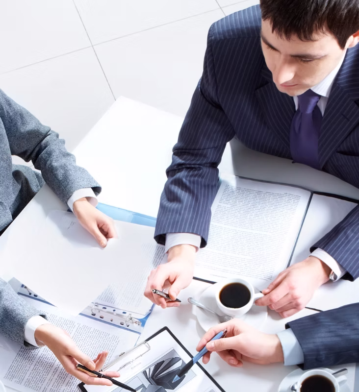 Business professionals discussing Performance Bond Guarantees and Contract Performance Security